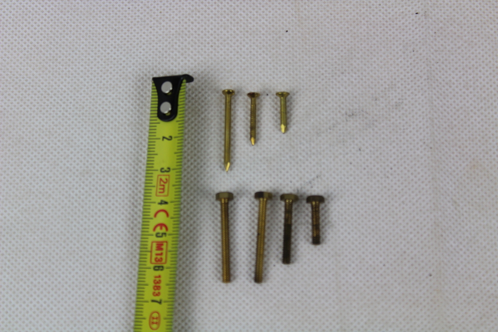 Image of 4.4 kilos of assorted brass hexagonal screws (bolts) and tacks (pins)