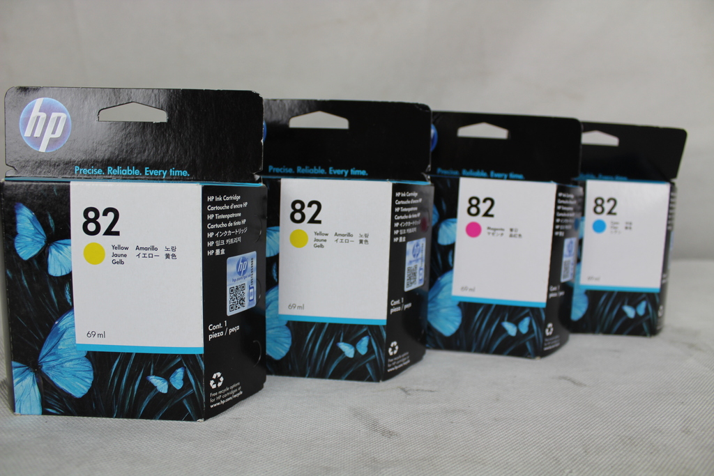 Image of 4 Genuine HP 82 ink cartridges 1 x Magenta, 1 x Cyan, 2 x yellow,