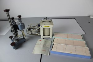 Thumbnail image of Thermograph with instructions, 3 boxes of graph paper and additional item