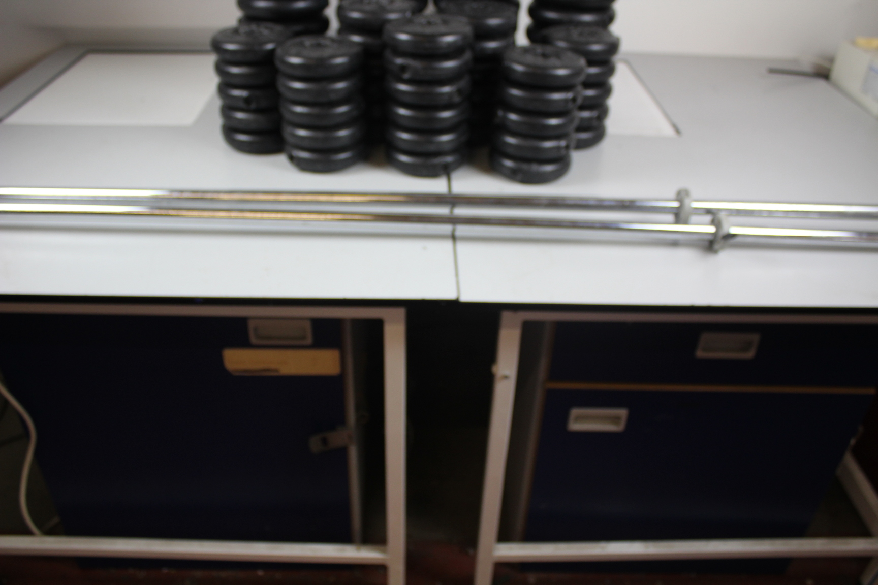 Image of Job Lot of York Weights 38 x 1.1kg, 34 x 2.3kg (120Kg) 19 Dumbbells, 2 Barbells 