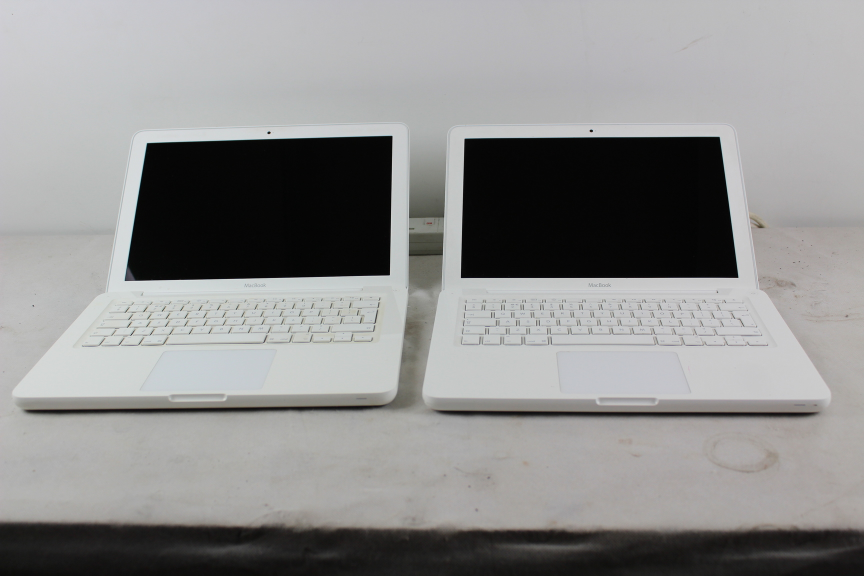 Image of Pair of Apple Macbook A1342 13.3" Laptops Spares/Repair only 
