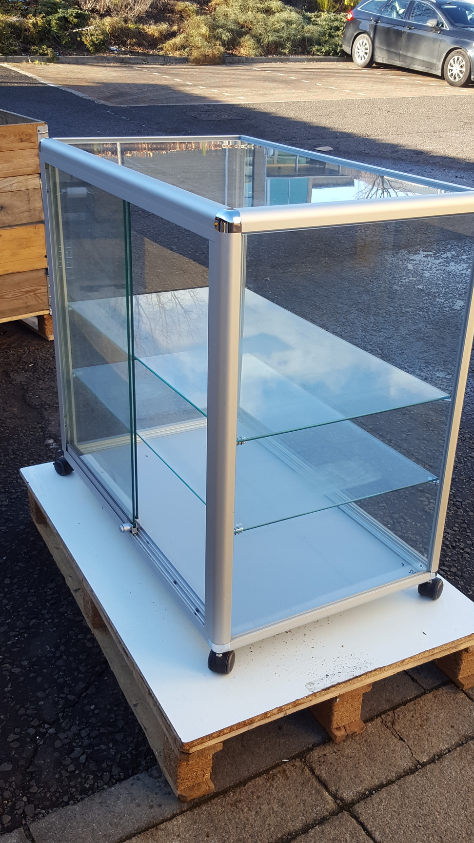 Image of Superb Glass Display Cabinet on Wheels with Glass Shelves Large