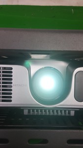 Thumbnail image of Hitachi Ed-X12 Projector + Remote, Locked in Security Cage