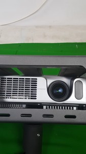 Thumbnail image of Hitachi Ed-X12 Projector + Remote, Locked in Security Cage
