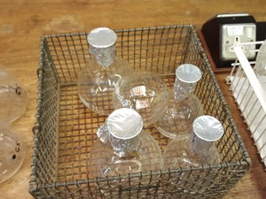 Thumbnail image of Large lot of Lab Glassware, Bottles, Test Tubes Measuring Cylinders Racks Flasks