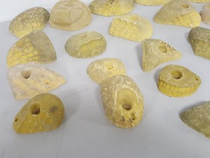 Thumbnail image of Lot of 21 Yellow Bouldering / Rock Climbing Grips Hand / Foot - No Bolts