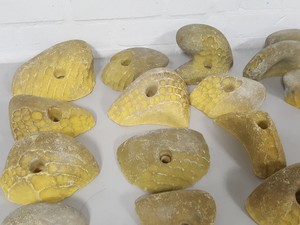 Thumbnail image of Lot of 25 Yellow Bouldering / Rock Climbing Grips Hand / Foot - No Bolts