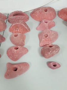 Thumbnail image of Lot of 25 Pink Bouldering / Rock Climbing Grips Hand / Foot - No Bolts