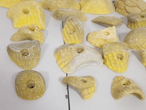 Thumbnail image of Lot of 25 Yellow Bouldering / Rock Climbing Grips Hand / Foot - No Bolts