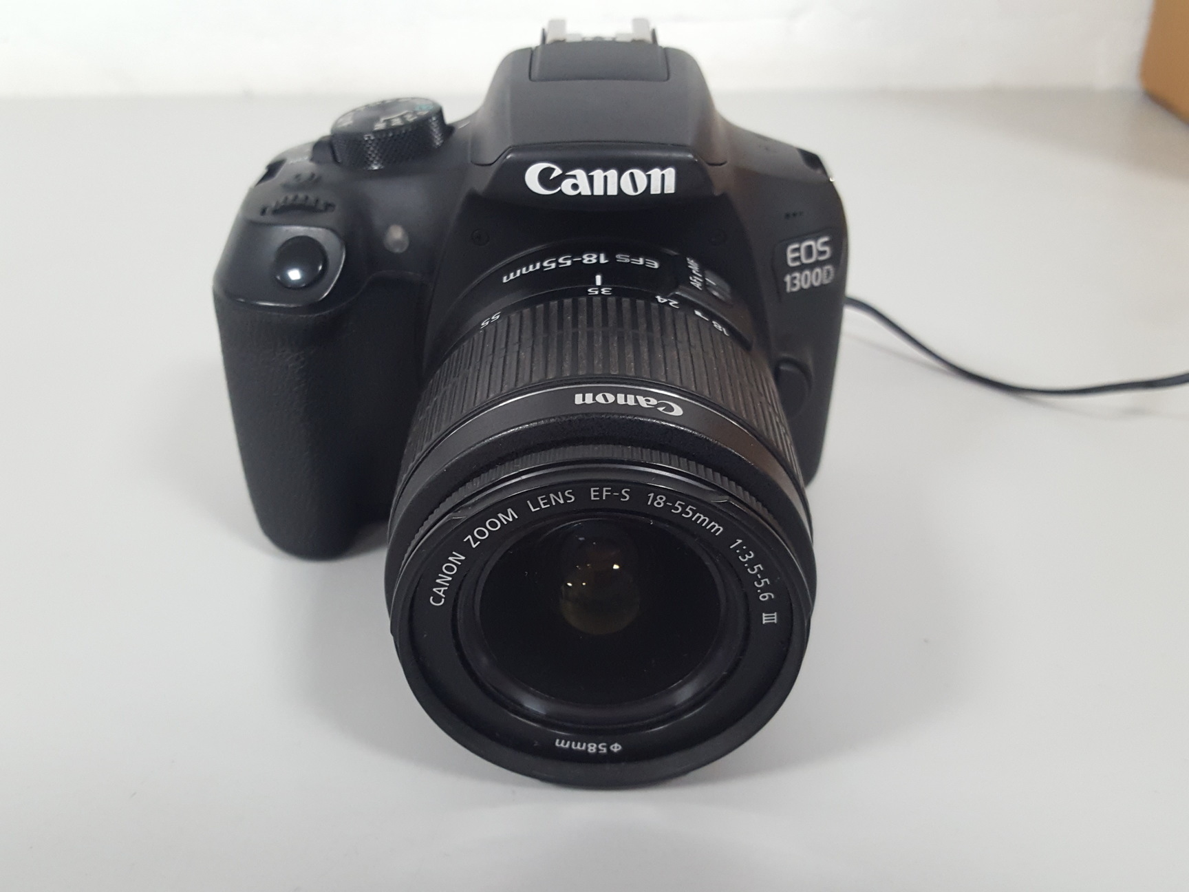 Image of Canon EOS 1300D Digital SLR Camera + AC Adapter + 18-55mm Lens