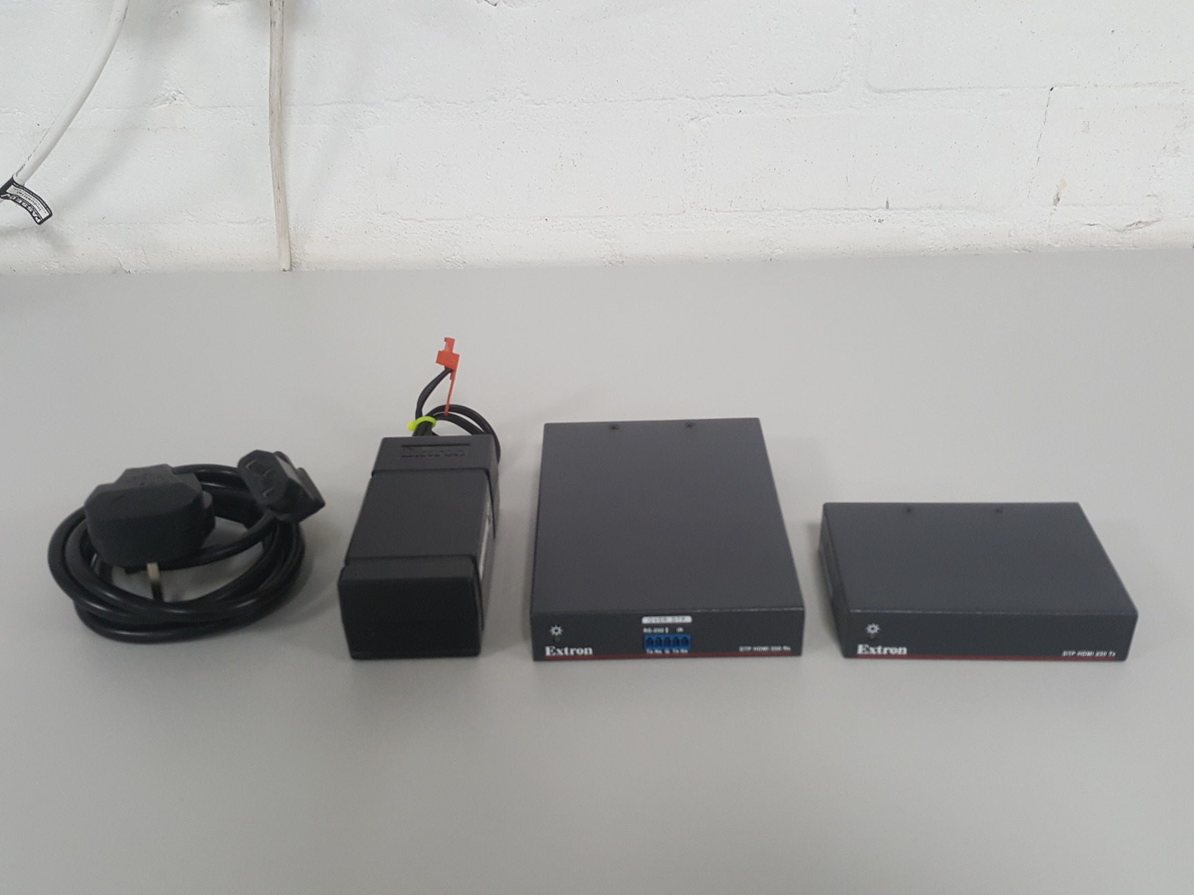 Image of 2x Extron DTP HDMI 230 Tx & DTP HDMI 230 Rx. Includes 1 x PSU & IEC cable