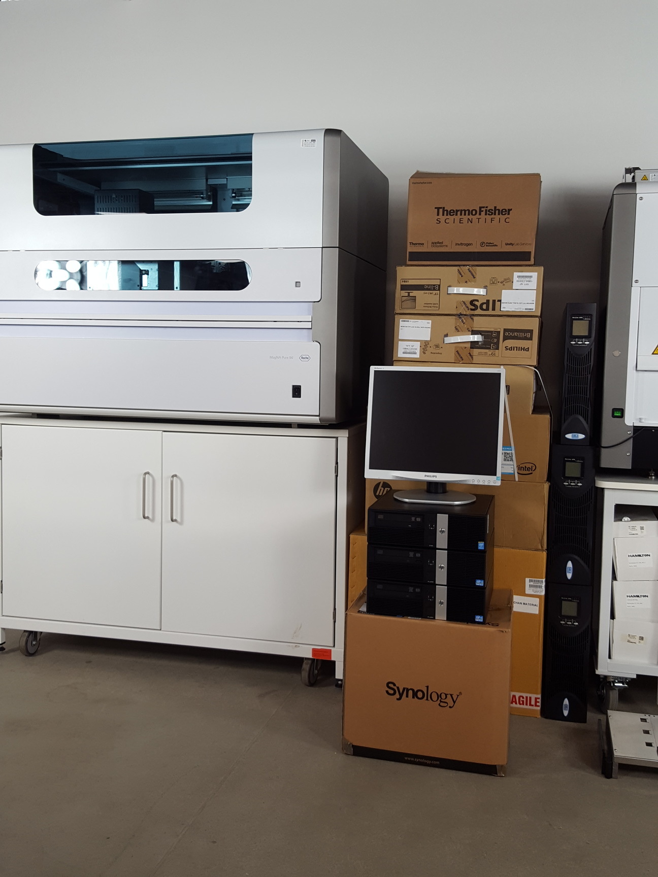 Image of Roche MagNA Pure 96 & Hamilton FLOW PCR System Lab Nucleic Extraction & Handling