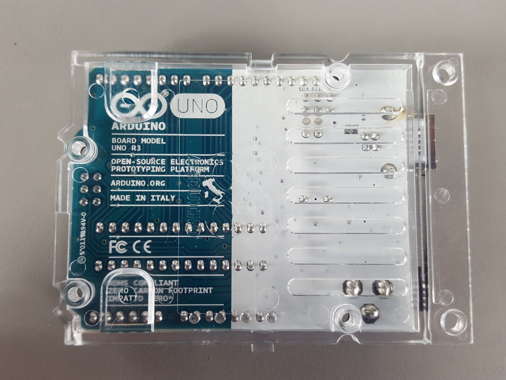 Image of Arduino Uno R3 & TinkerKit Sensor Shield Boards