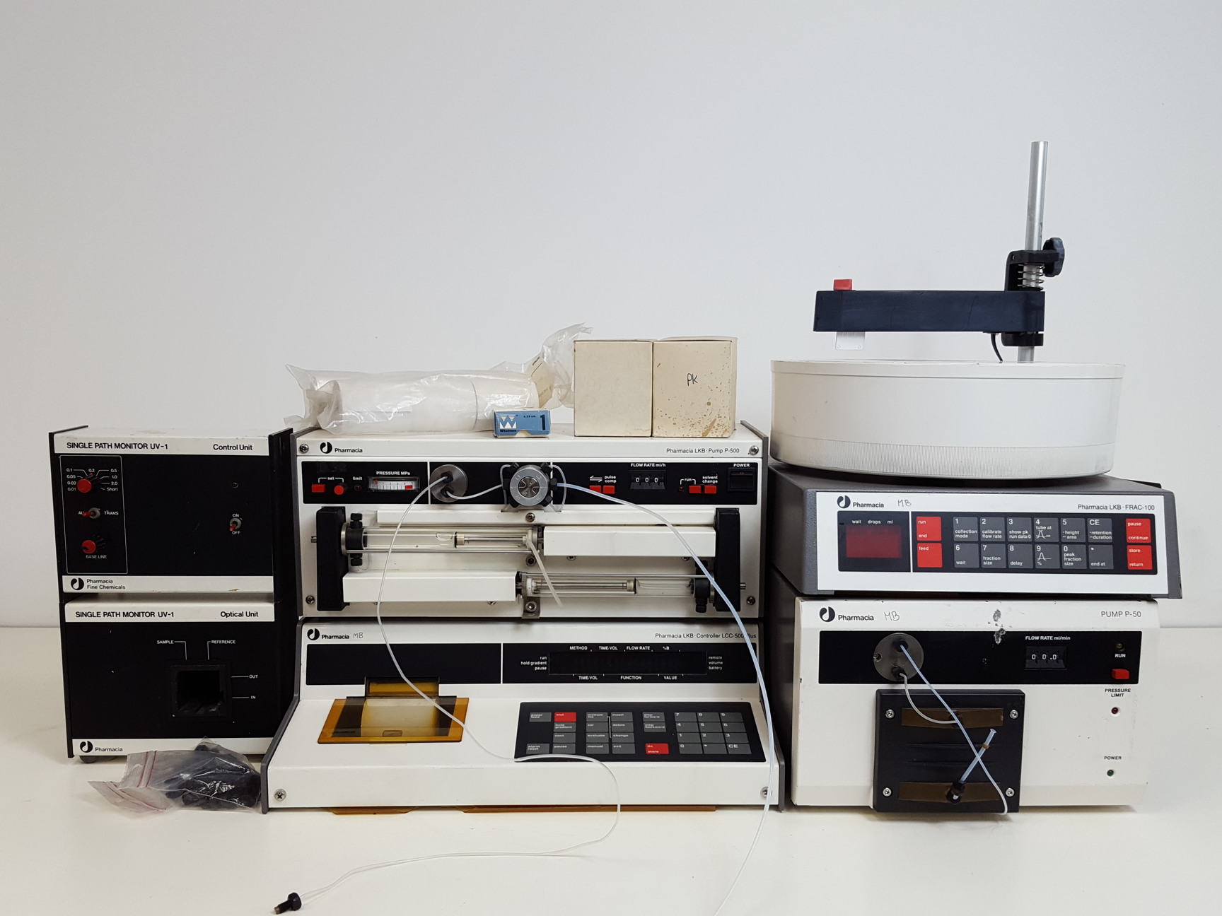 Image of Pharmacia LKB FPLC System - P-500, FRAC-100, P-50, UV-1, LCC-500 & Accessories 