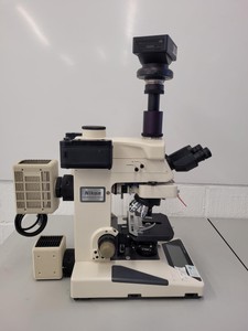 Thumbnail image of Nikon Microphot-FXA Fluorescence Microscope with HP-10101AF PSU & 4 x Objectives