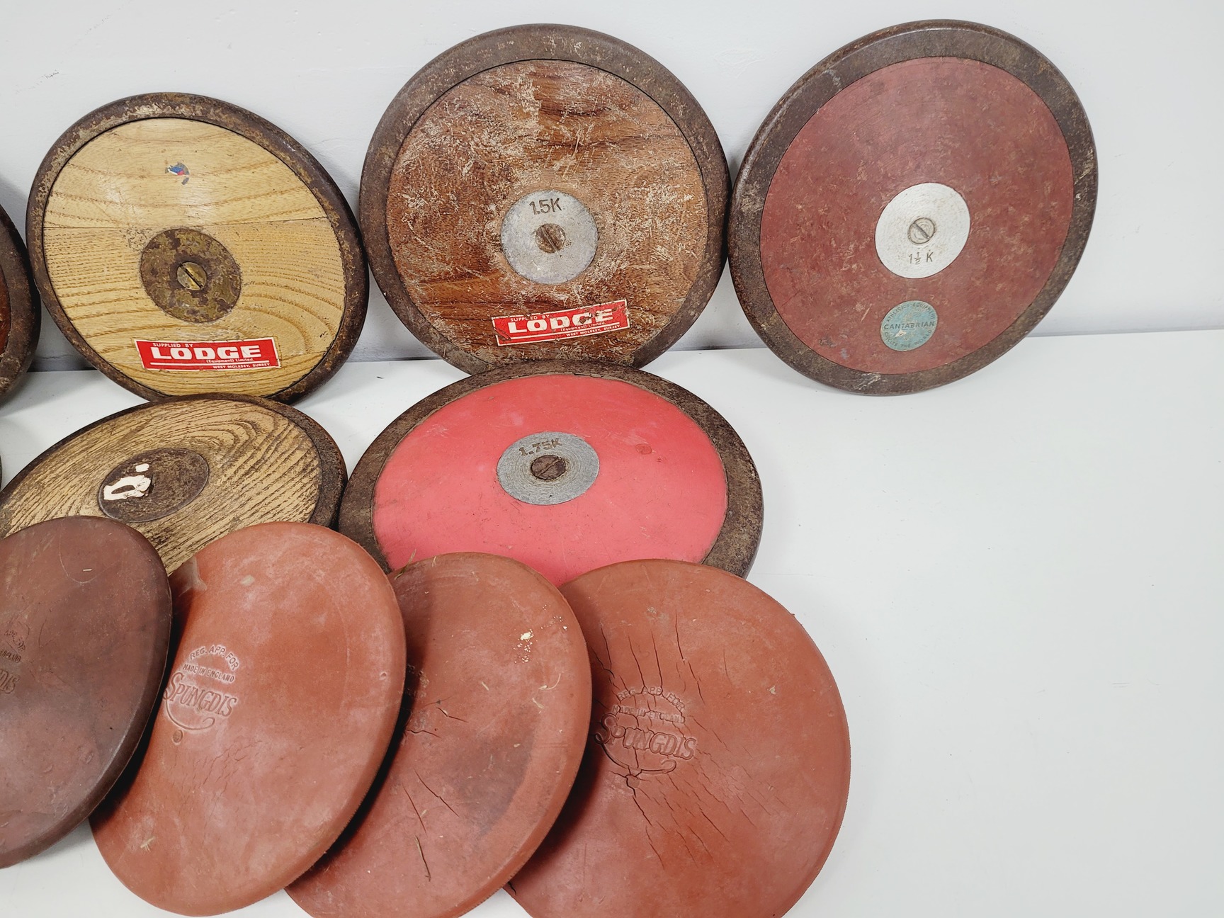 Image of Job Lot of Vintage Shot Put Balls and Discus Sports Athletics Equipment