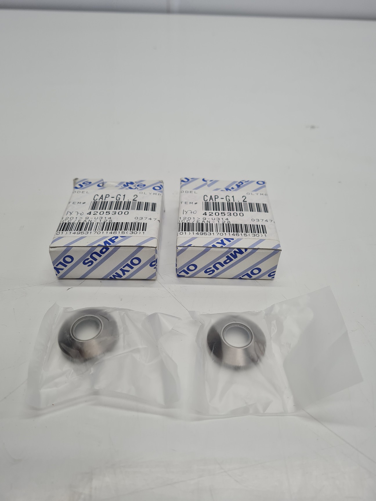 Image of Pair of Olympus Correction Caps Cap-G1.2 LCPlanFL Objectives Lab