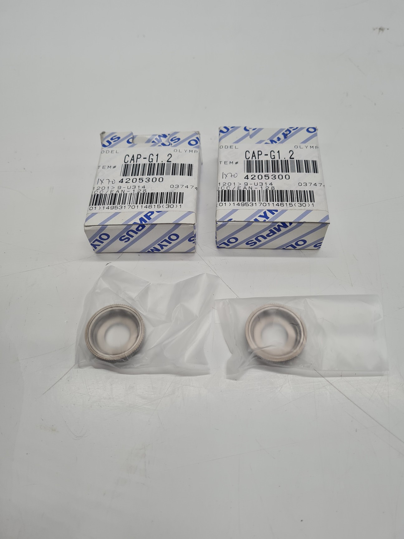 Image of Pair of Olympus Correction Caps Cap-G1.2 LCPlanFL Objectives Lab