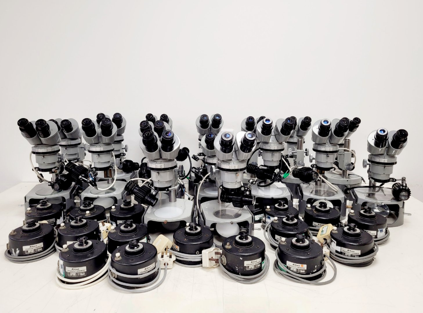 Image of Job Lot of 16 Grey Nikon Stereo Microscopes & Transformers Lab