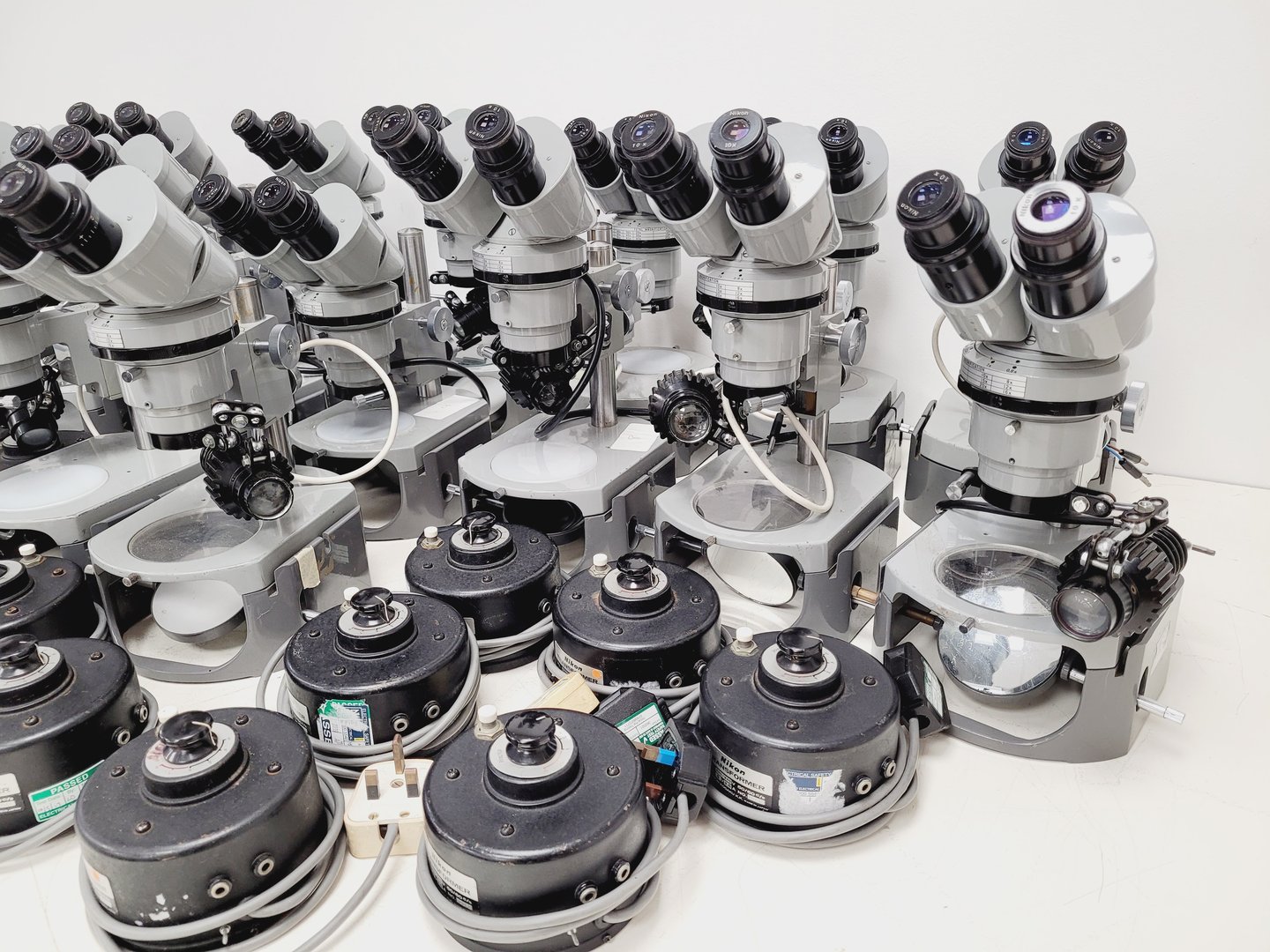 Image of Job Lot of 16 Grey Nikon Stereo Microscopes & Transformers Lab