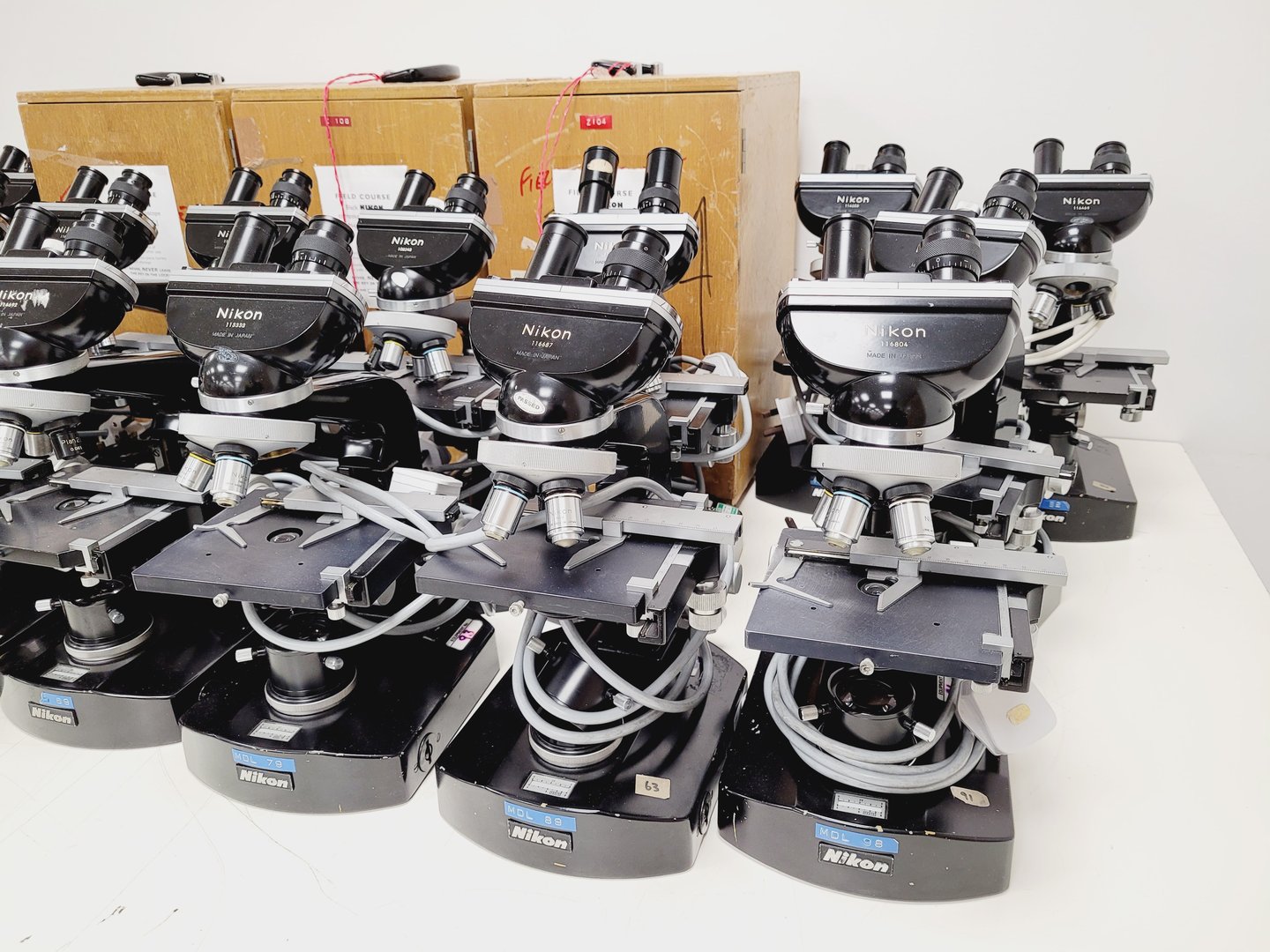 Image of Job lot of 21 x Black Nikon Compound Microscopes with Accessories Lab