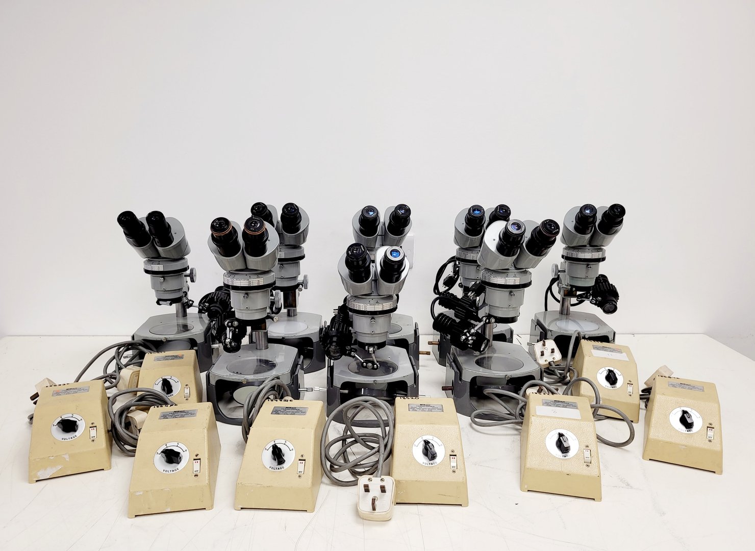 Image of Job Lot of 9 Grey Nikon Stereo Microscopes & Transformers Lab