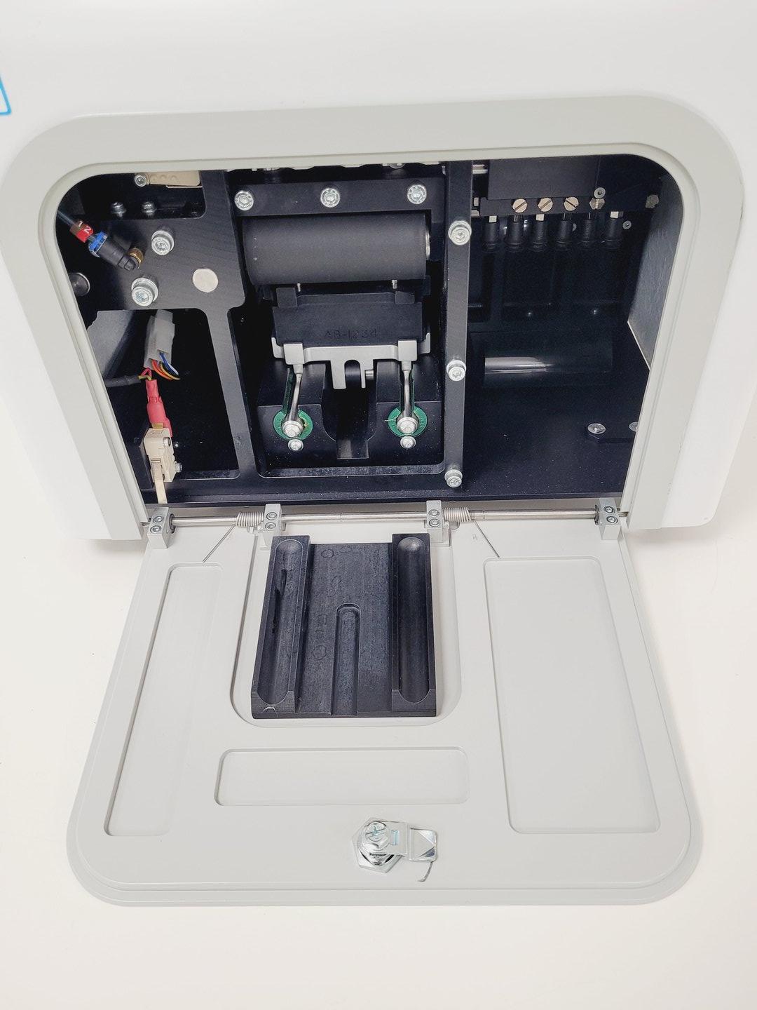 Image of FluidX X-Seal AAS Automated Adhesive Sealer with Bambi VT75 Compressor Lab