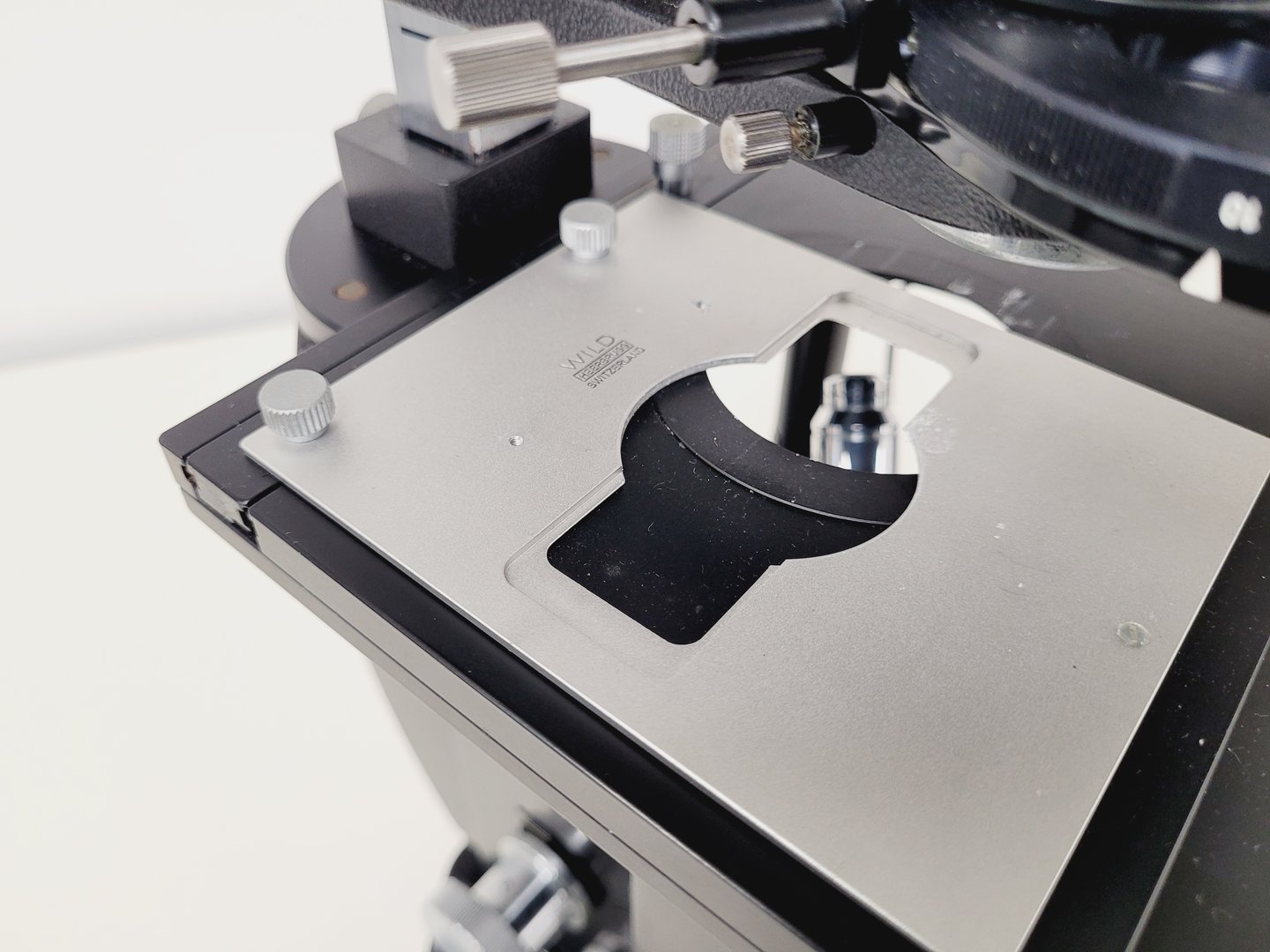 Image of Wild Heerbrugg M40A Inverted Microscope 4/0.10, 10/0.25 Ph, 20/0.25 Ph, 40/0.25