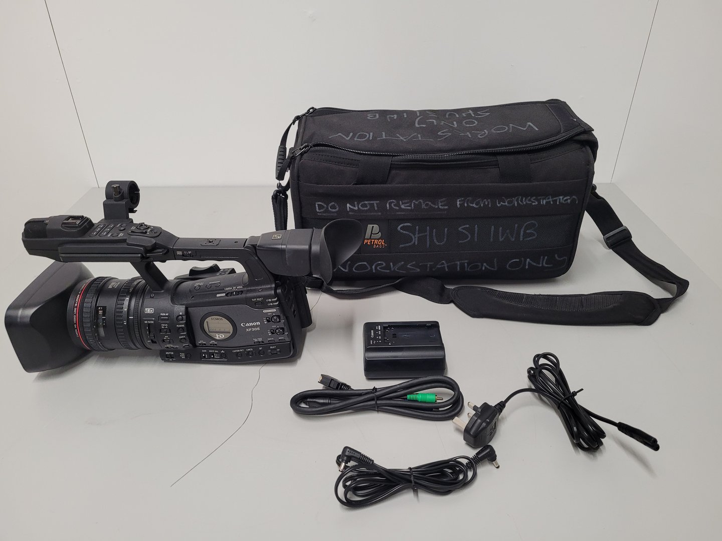 Image of Canon XF305 HD Video Camera with Charger w/ Power Adapter