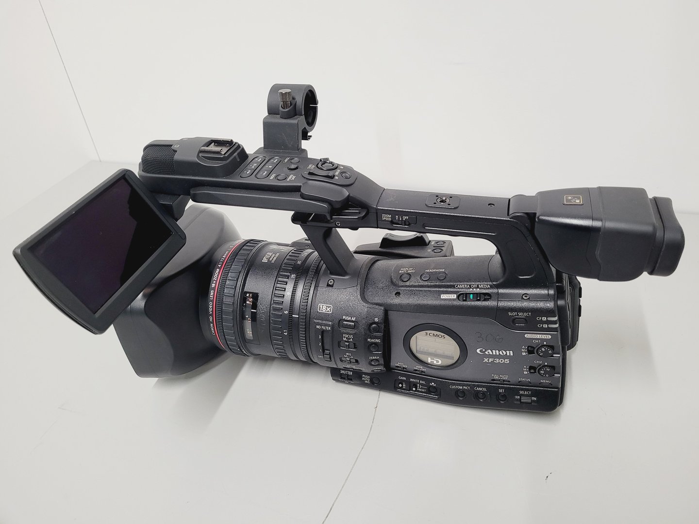 Image of Canon Model XF305 HD Video Camera Camcorder with Charger - Power Adapter