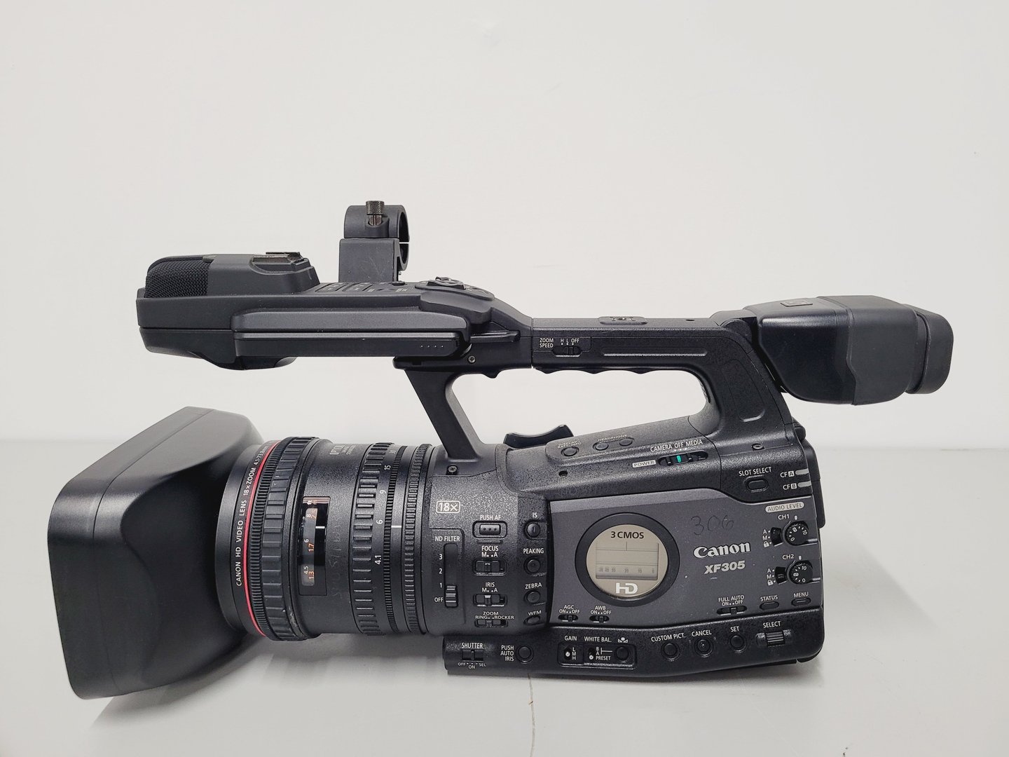 Image of Canon Model XF305 HD Video Camera Camcorder with Charger - Power Adapter