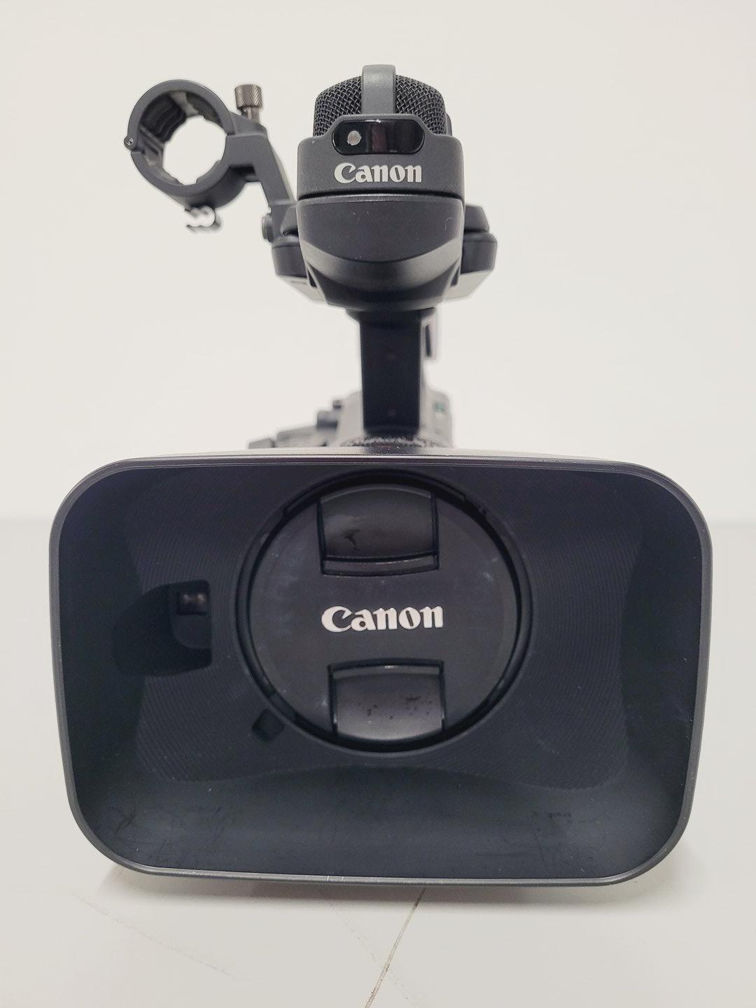 Image of Canon Model XF305 HD Video Camera Camcorder with Charger - Power Adapter