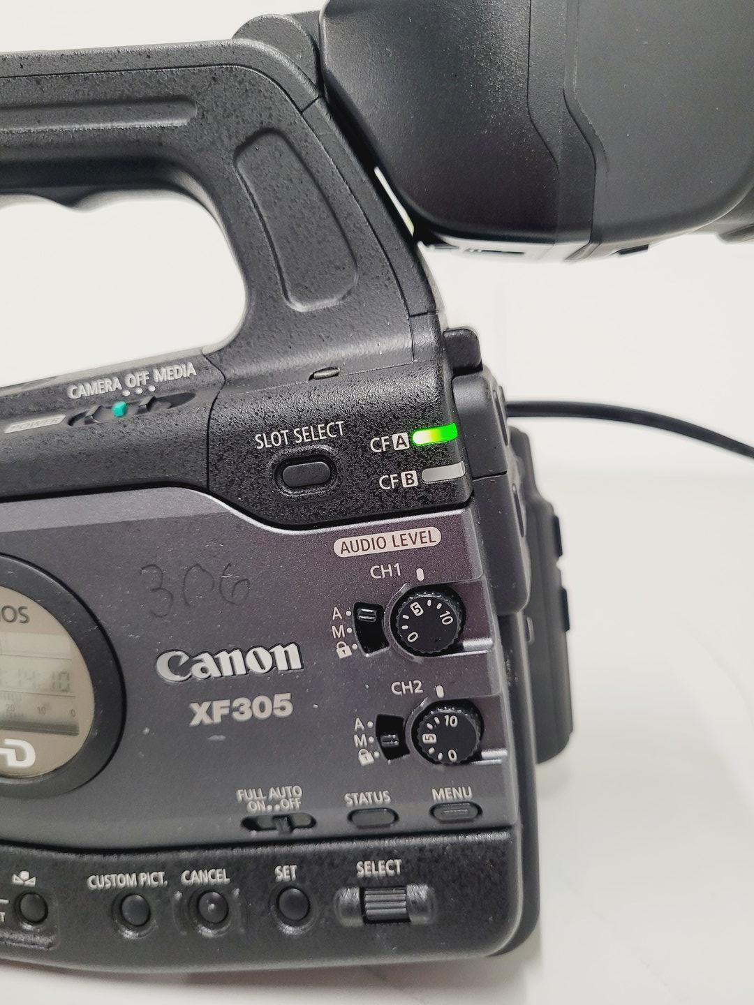 Image of Canon Model XF305 HD Video Camera Camcorder with Charger - Power Adapter