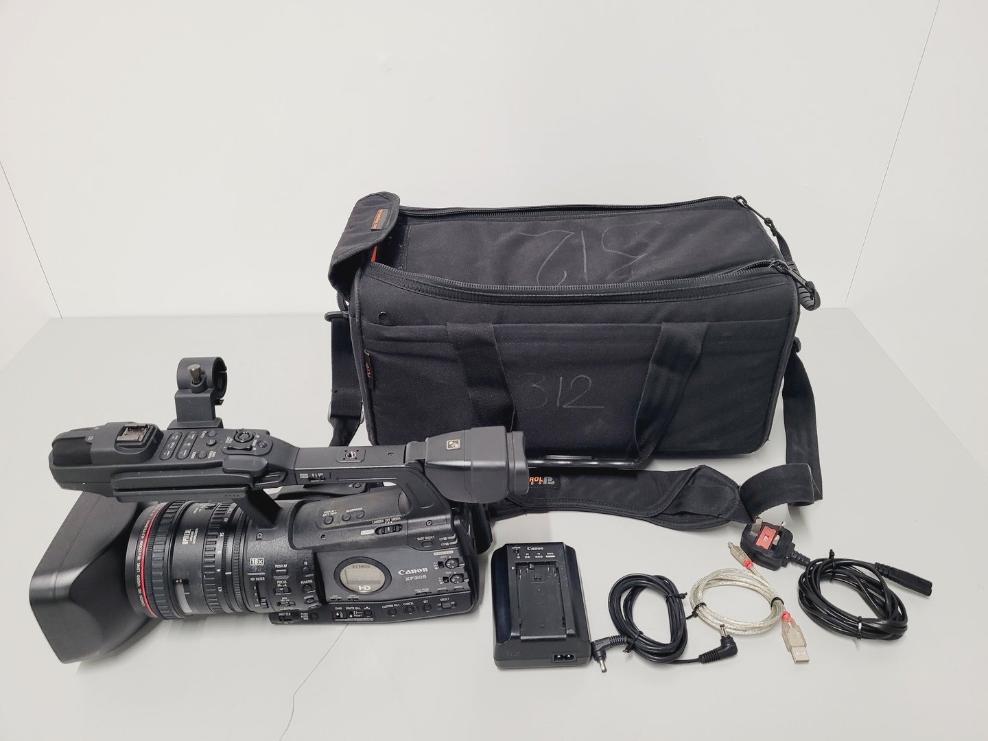 Image of Canon XF305 PAL HD Video Camera Camcorder with Charger - Power Adapter