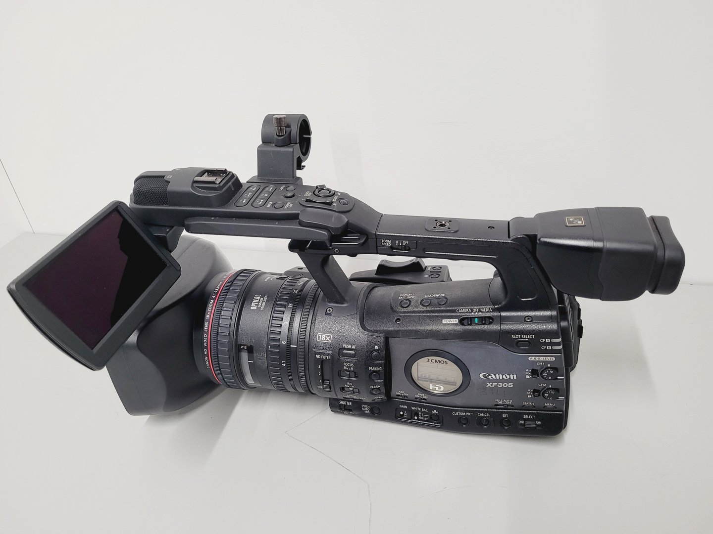 Image of Canon XF305 PAL HD Video Camera Camcorder with Charger - Power Adapter