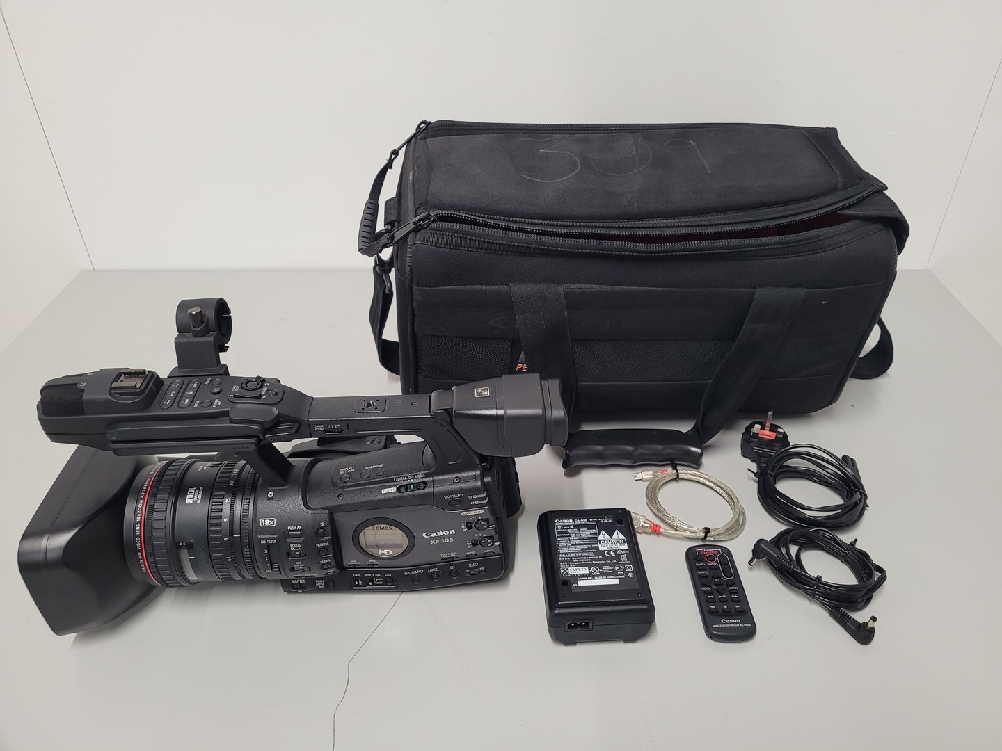 Image of Canon Model XF305 HD Video Camera 1 x Battery, Remote Control and Charger