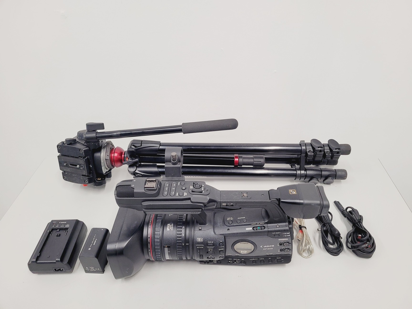 Image of Canon XF305 HD PAL Video/Camera Camcorder and Manfrotto 755XB Tripod