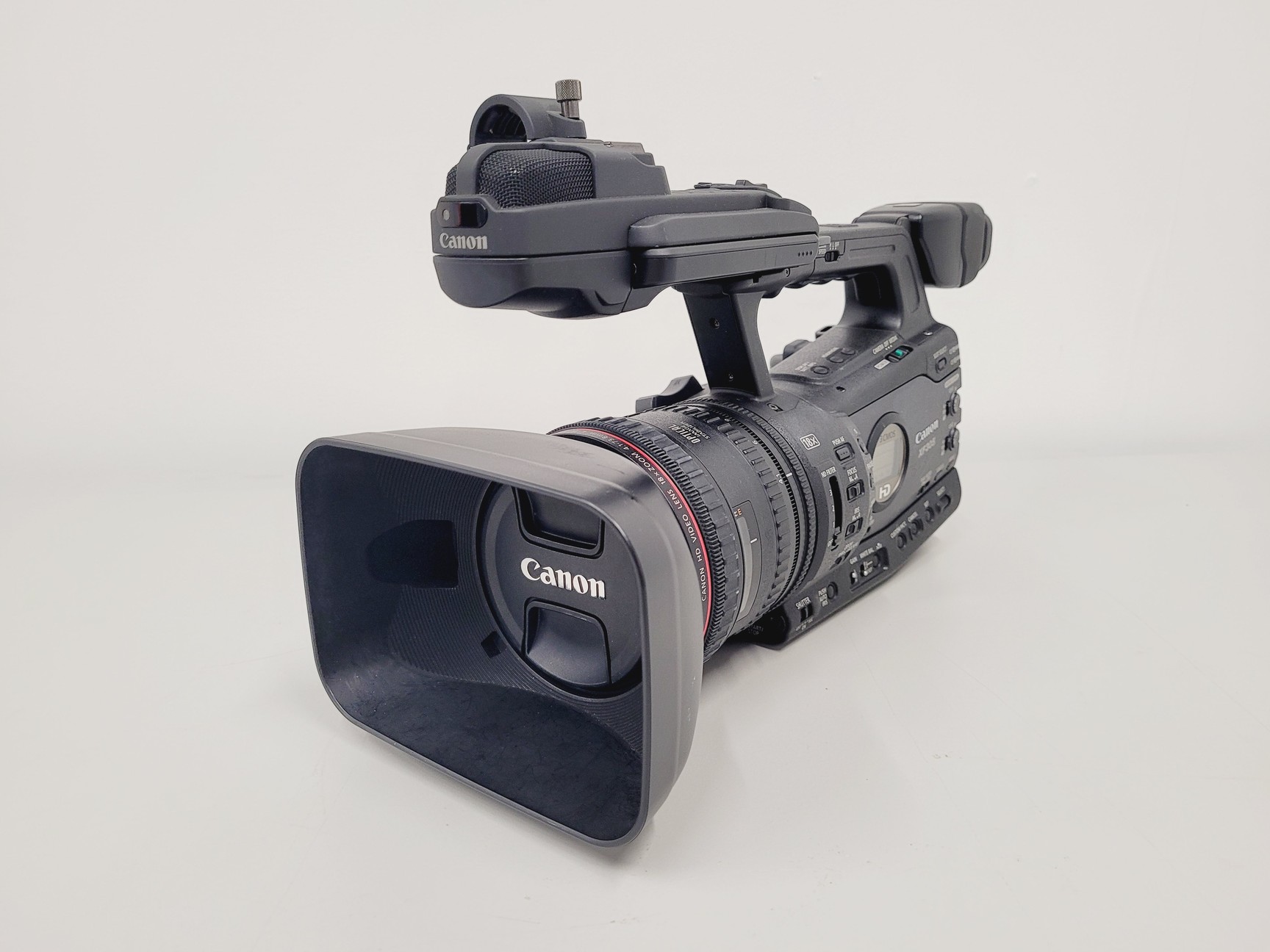 Image of Canon XF305 HD PAL Video/Camera Camcorder and Manfrotto 755XB Tripod