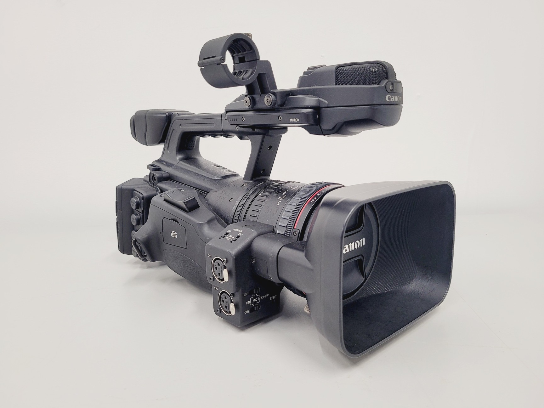 Image of Canon XF305 HD PAL Video/Camera Camcorder and Manfrotto 755XB Tripod