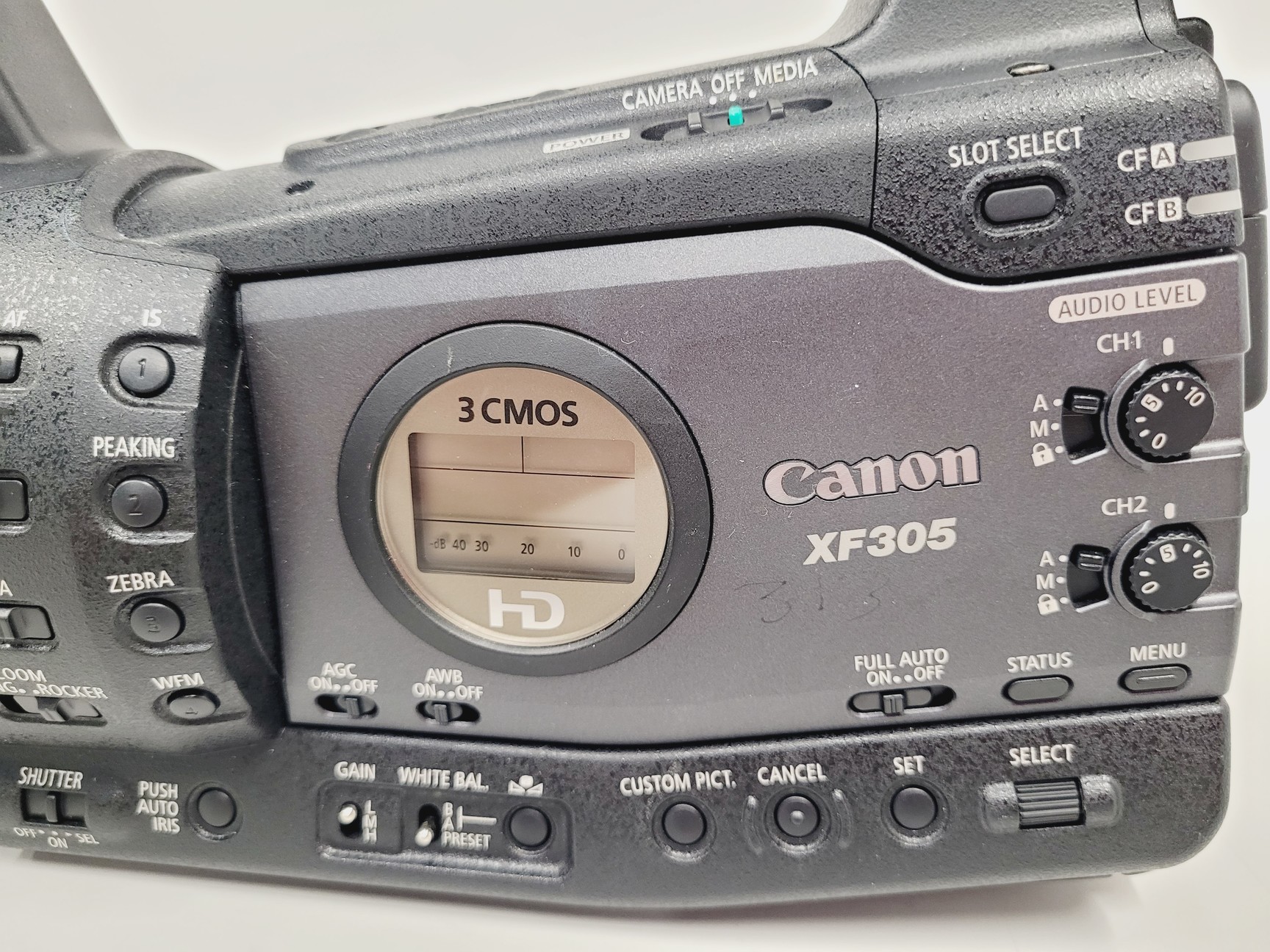 Image of Canon XF305 HD PAL Video/Camera Camcorder and Manfrotto 755XB Tripod
