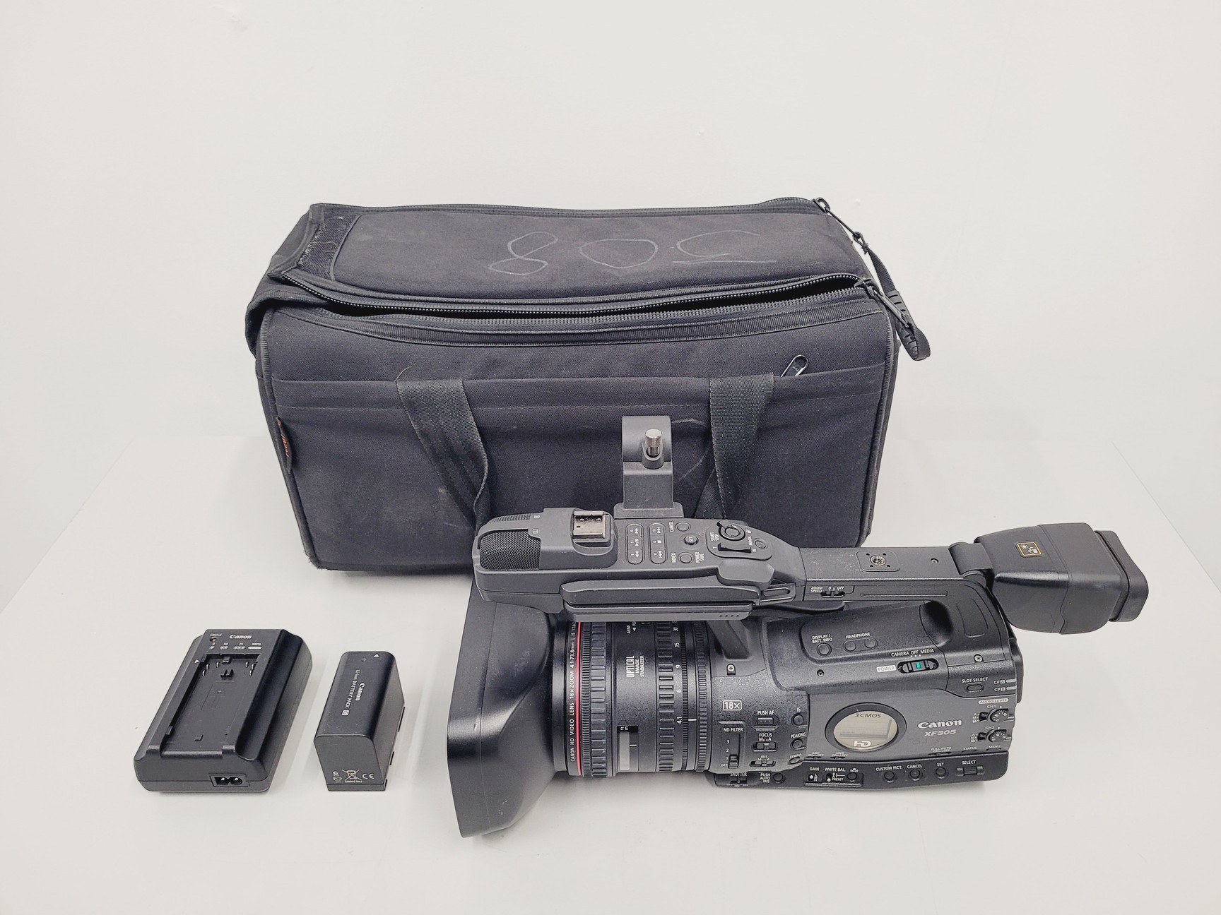 Image of Canon XF305 HD PAL Video/Camera Camcorder and Manfrotto 755XB Tripod