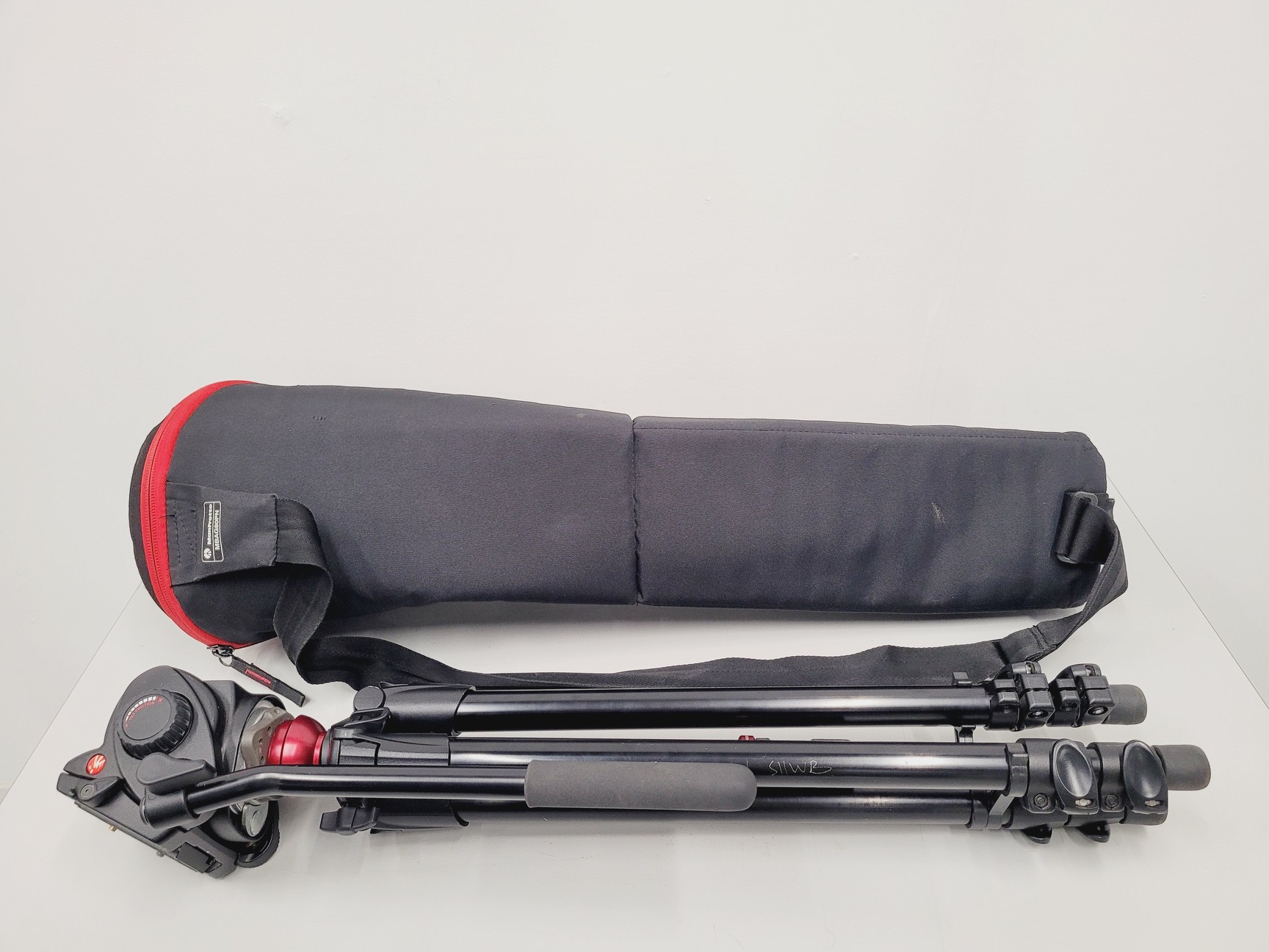 Image of Canon XF305 HD PAL Video/Camera Camcorder and Manfrotto 755XB Tripod