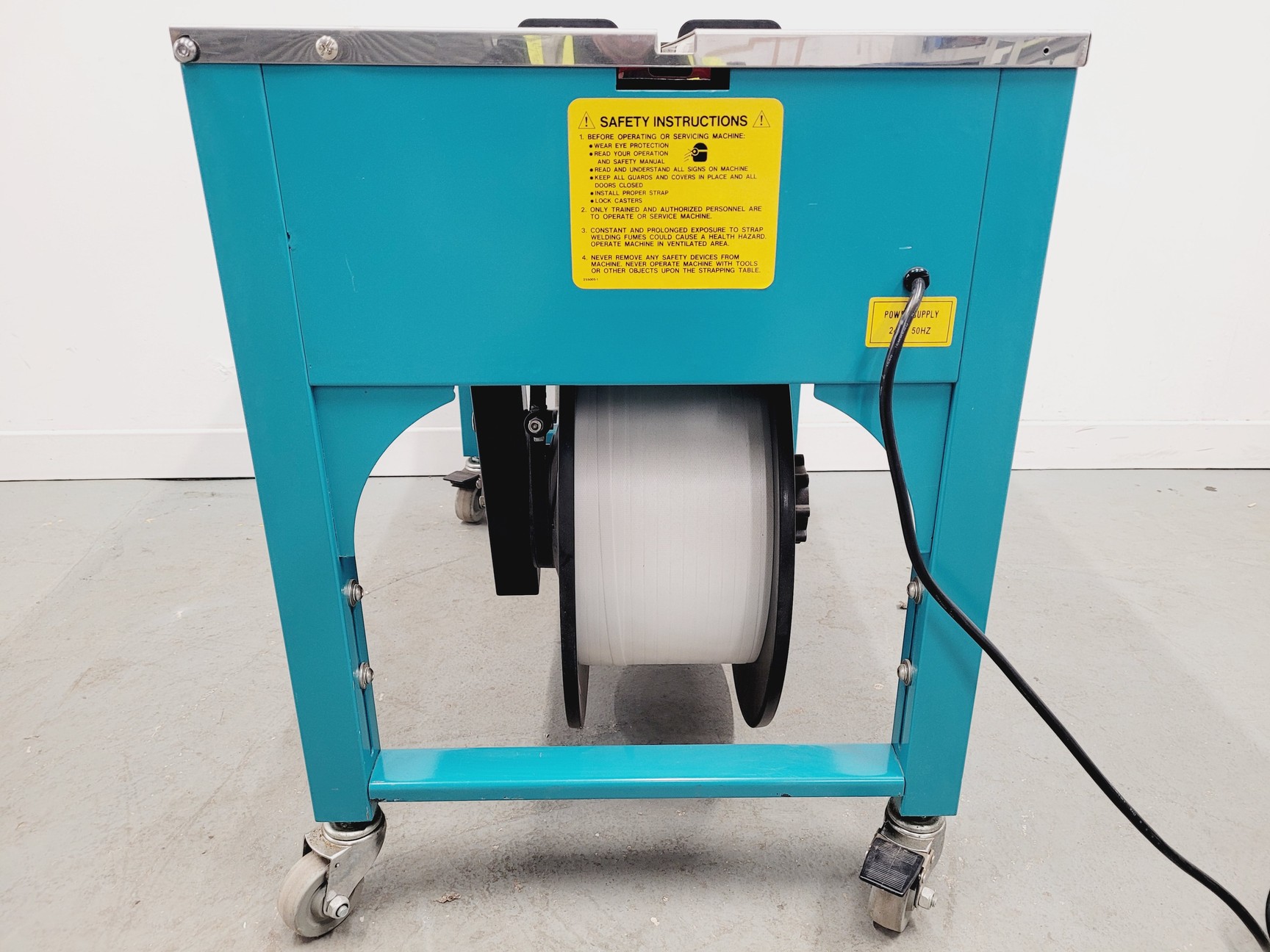 Image of Packer Systems EXS-206 Semi-Automatic Polypropylene Strapping Machine