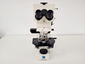 Thumbnail image of Carl Zeiss Axiophot Microscope Part No. 45 18 87 w/  5 x Zeiss Plan-NEOFLUAR