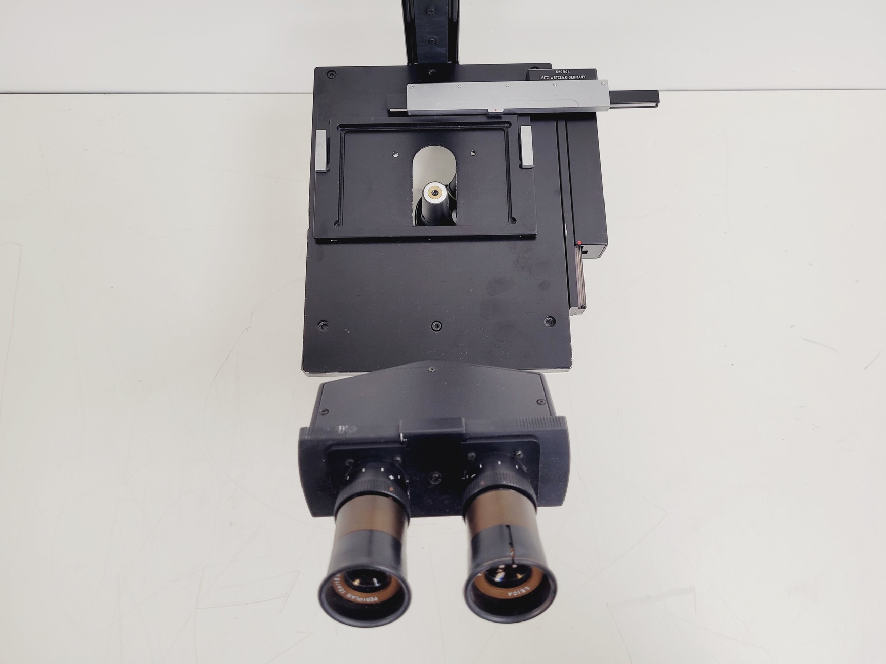 Image of Leica DMIL 090-131-00.1 Microscope Body w/ 4 Objectives + Eye pieces
