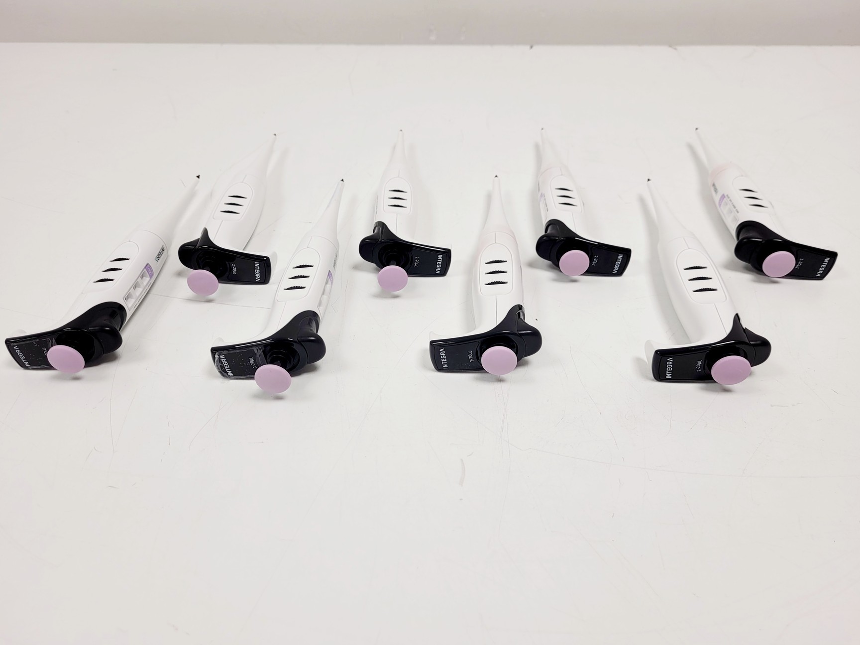 Image of Job Lot of 43 x EVOLVE Integra Pipettes (0.2-2ul - 500-5000ul) w/ 5 x Stand Lab