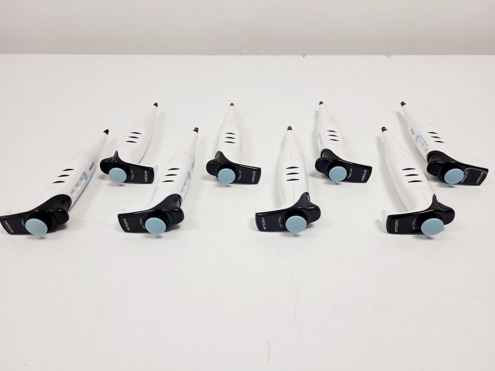 Image of Job Lot of 43 x EVOLVE Integra Pipettes (0.2-2ul - 500-5000ul) w/ 5 x Stand Lab
