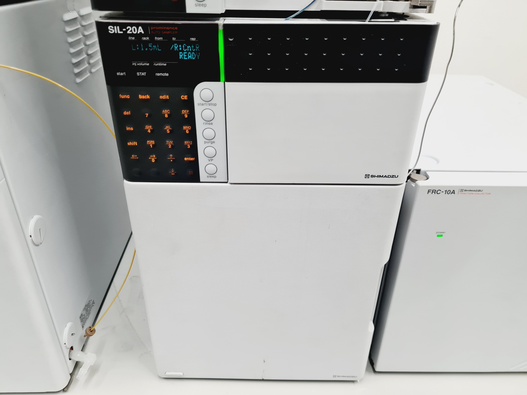 Image of Shimadzu HPLC System with SIL-20A, LC-20AD, DGU-20A5, CTO-20A, CMB-20A, SPD-20AV