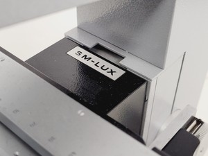 Thumbnail image of Leitz SM-LUX Binocular Microscope w/ 5 x Objectives 25/40/100 Fluotar